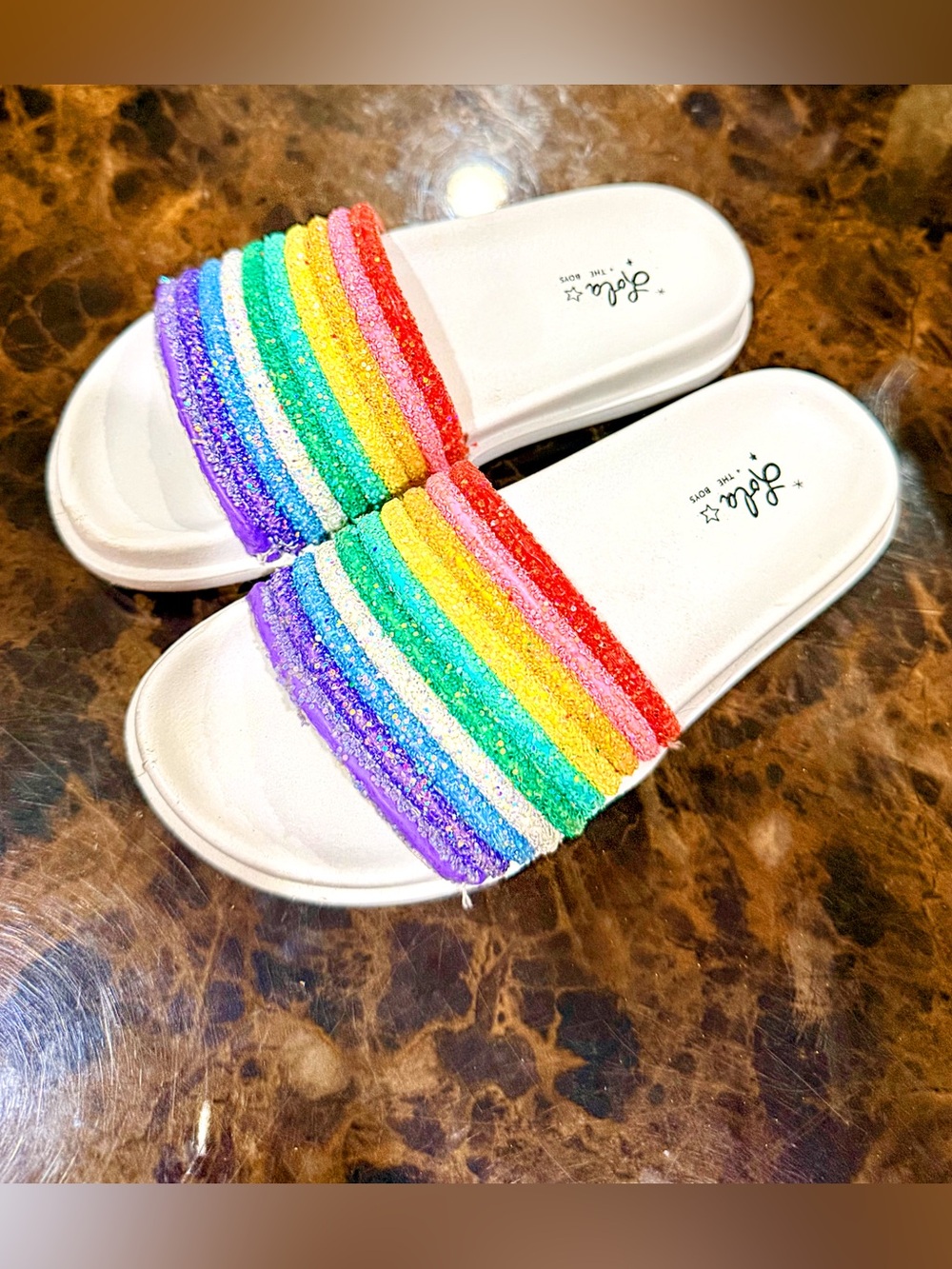 Lola + The Boys White Slide Sandals with Rainbow Glitter Straps